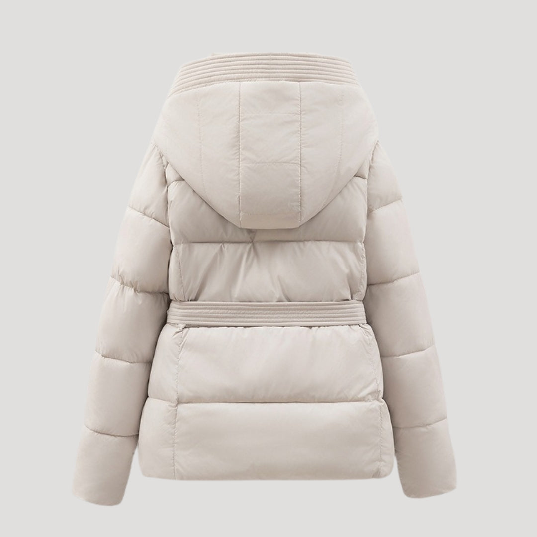 Beige puffer jacket on a light gray background