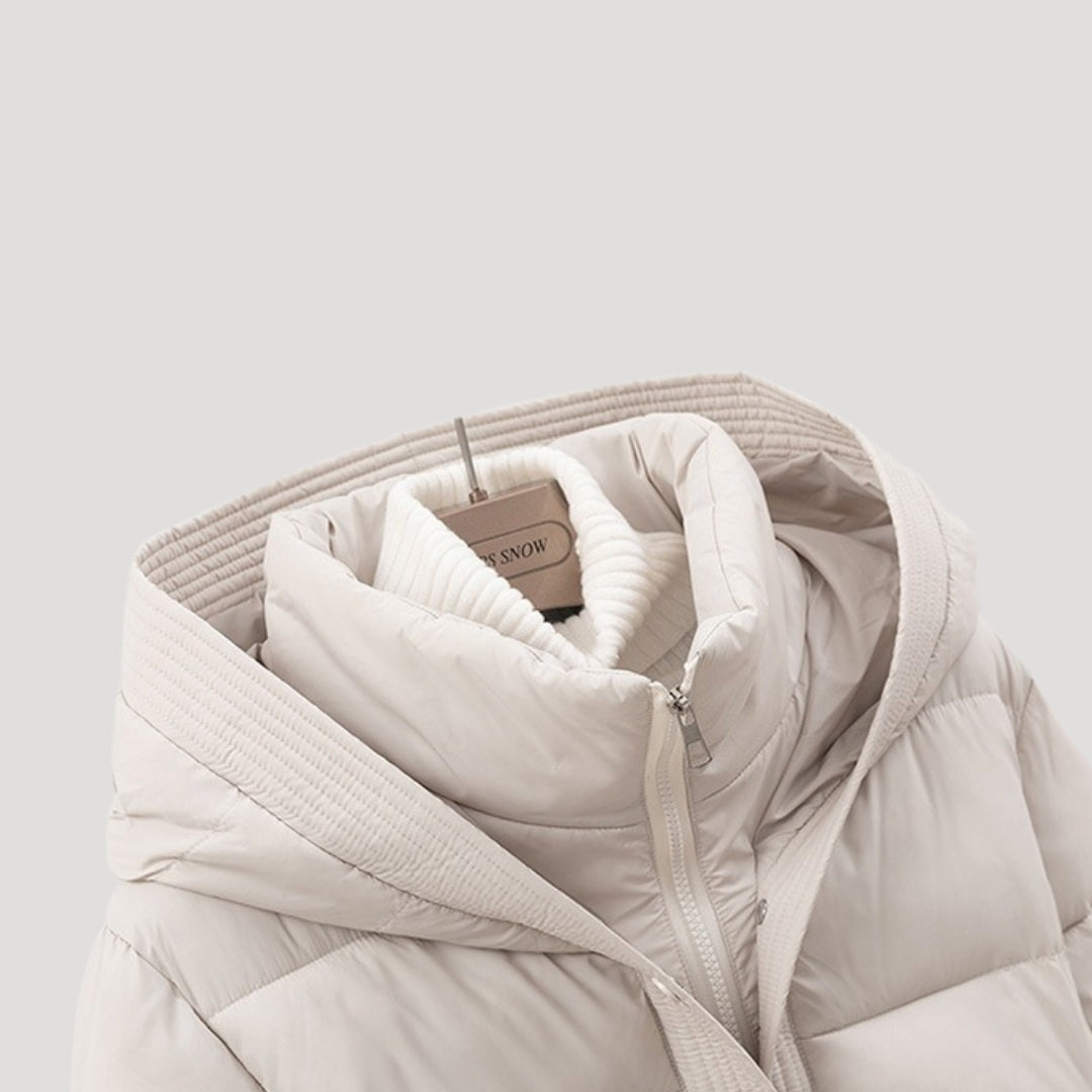 Beige puffer jacket on a light gray background